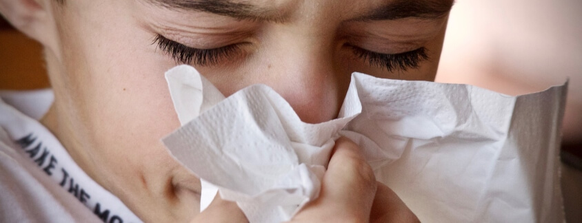 sneezing is a symptom of allergies