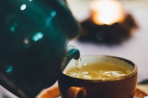 person pouring liquid into brown ceramic cup 814264 300x200 - Science-backed Superfoods And Their Benefits