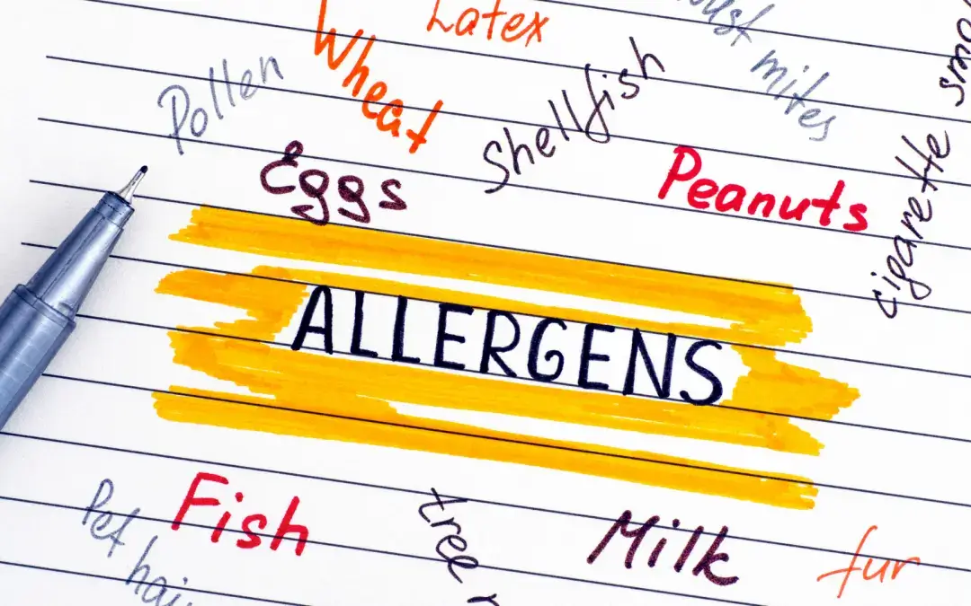 a paper with the text allergens highlighted and various words scribbled around it